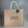 Custom printed heavy-weave JuCo (jute cotton) bag with white rope handles, landscape shape, front view with sample logo