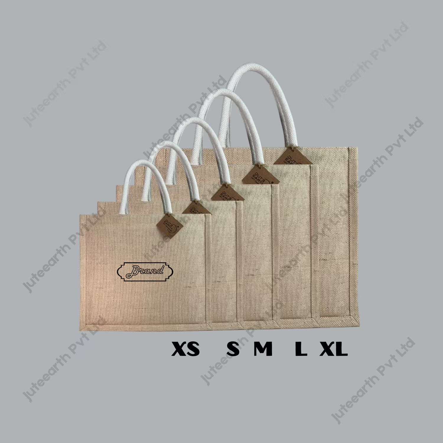 Custom printed heavy-weave JuCo (jute cotton) bag with white rope handles, landscape shape, sizes XS to XL stacked to show scale