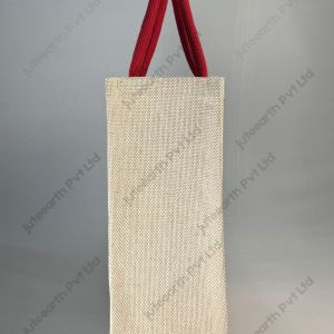 Custom printed JuCo (jute cotton) bag with red concentric quarter-circle print and red rope handles, side view showing the gusset