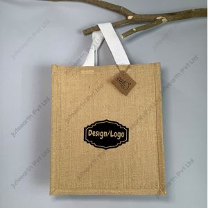 Custom printed natural jute bag with starch finish and white cotton handles, narrow shape, front view with sample logo