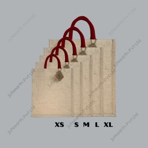 Plain heavy-weave JuCo (jute cotton) bag with red cotton rope handles, narrow shape, sizes XS to XL stacked to show scale